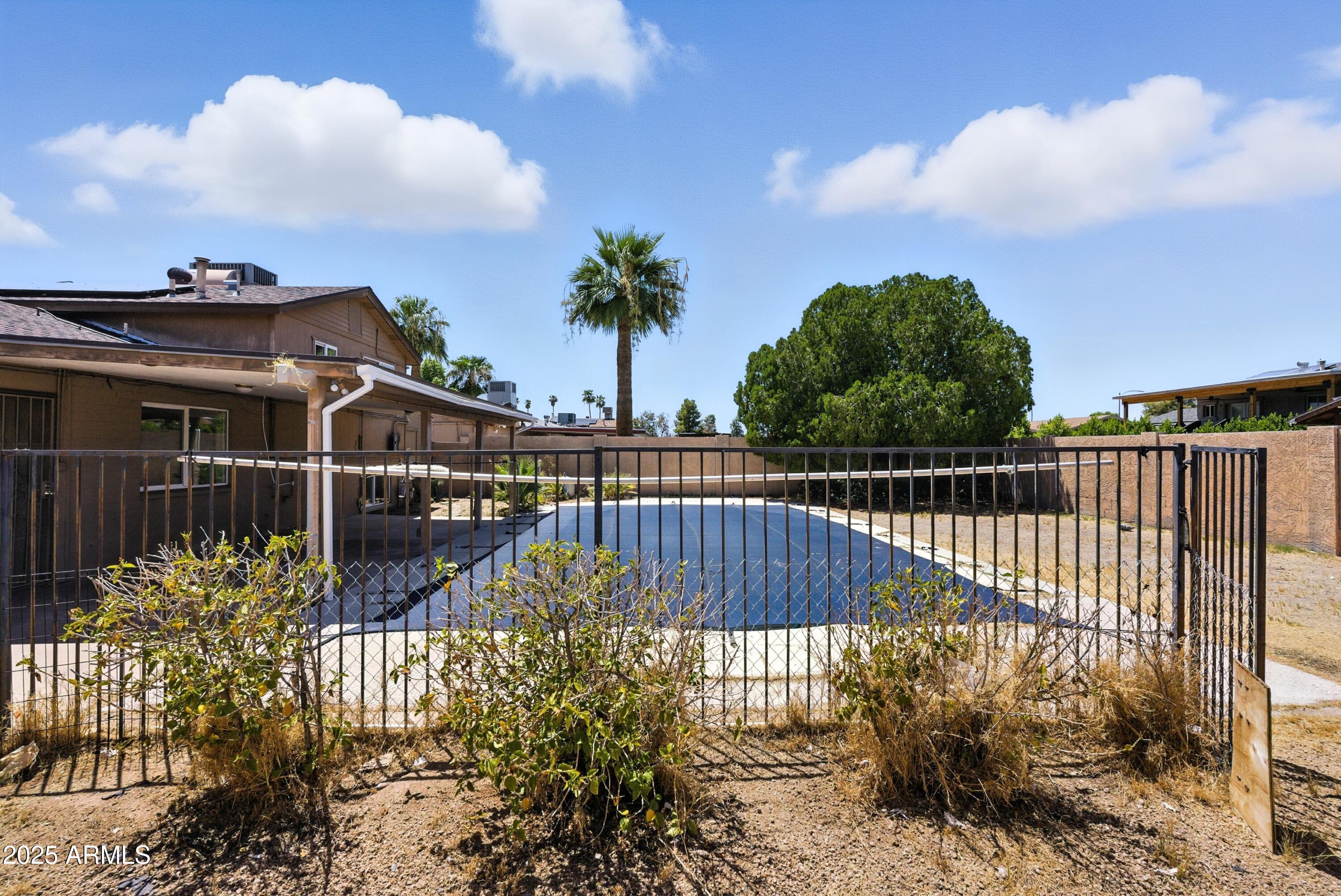 3724 West Bloomfield Road Phoenix, AZ 85029 - Photo 30 of 32 a view of a wrought iron fences in front of house
