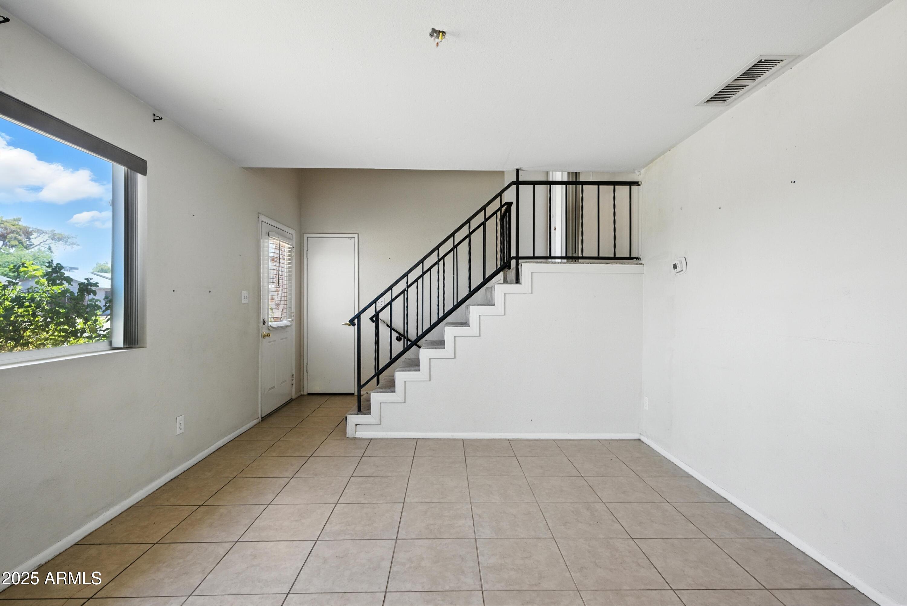 3724 West Bloomfield Road Phoenix, AZ 85029 - Photo 6 of 32 a view of entryway and hall with a window