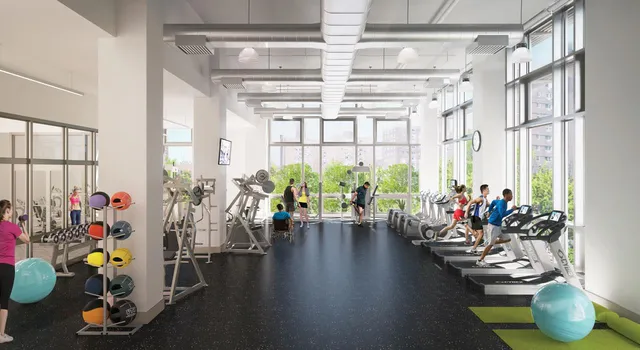 a living room filled with furniture and a chandelier