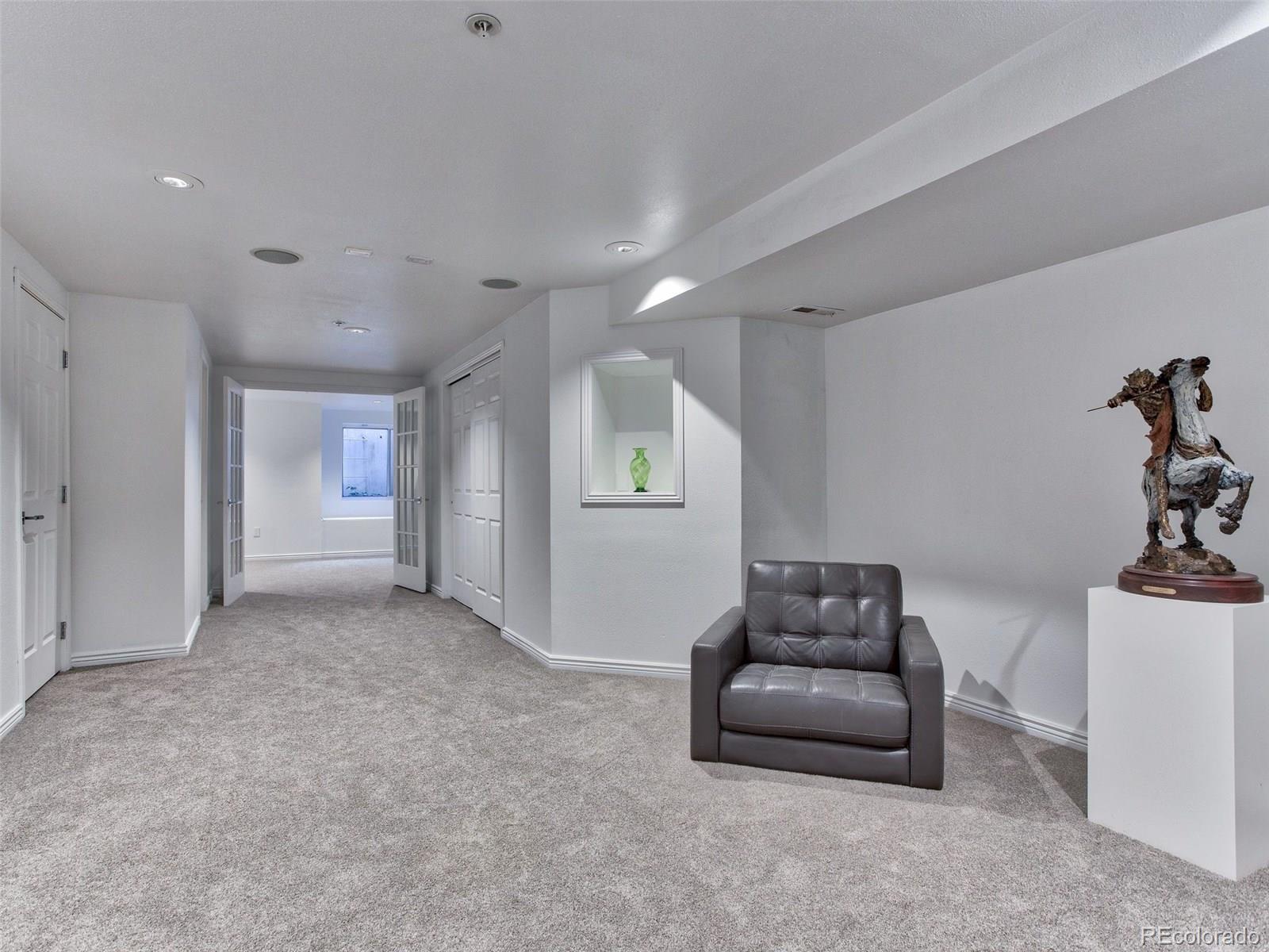 13 South Garfield Street Denver, CO 80209 - Photo 20 of 27 a living room with furniture and window