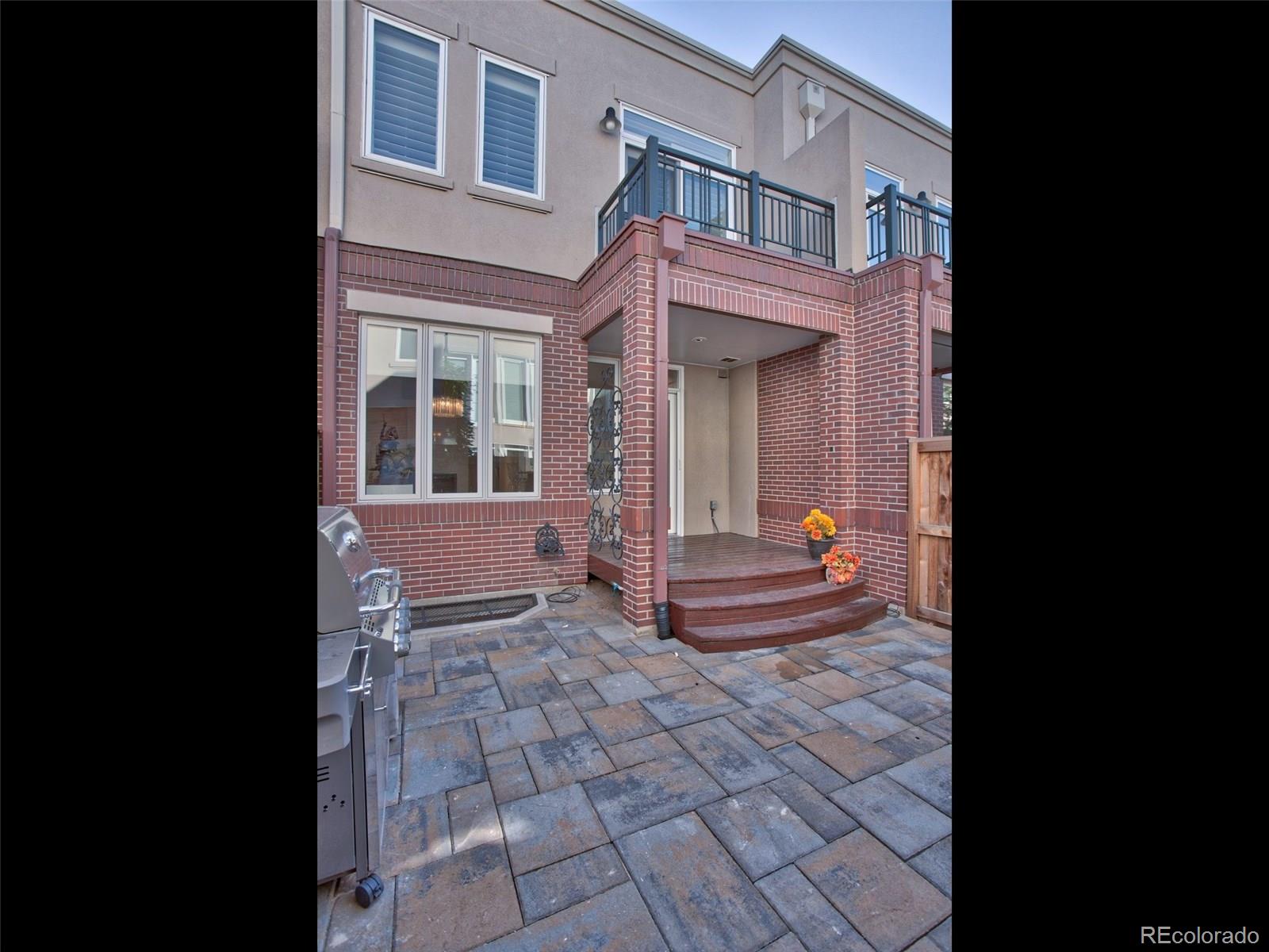 13 South Garfield Street Denver, CO 80209 - Photo 26 of 27 a view of a building with a outdoor seating