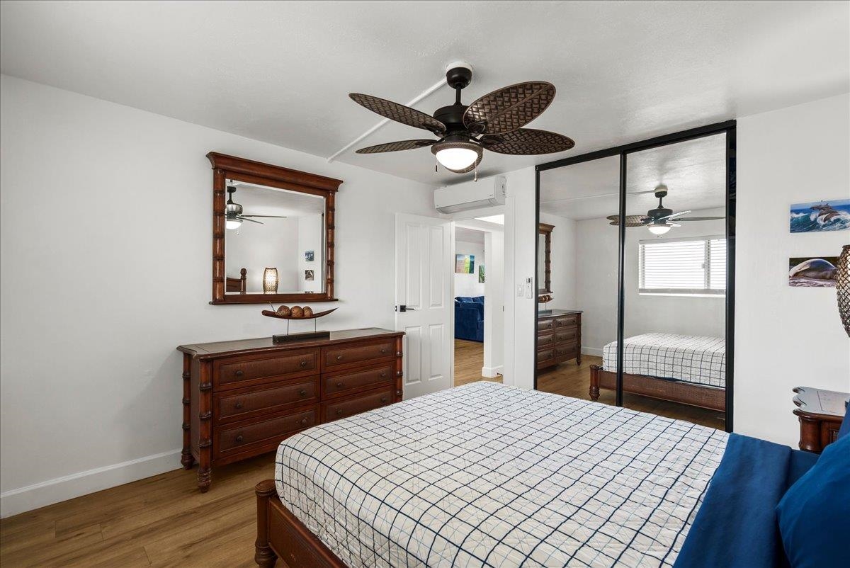 760 South Kihei Road, Unit 405 Kihei, HI 96753 - Photo 26 of 39 a bedroom with a bed and a dresser