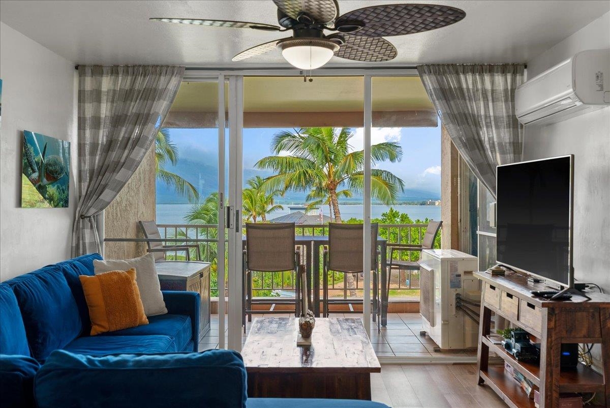 760 South Kihei Road, Unit 405 Kihei, HI 96753 - Photo 7 of 39 a living room with fireplace furniture and a flat screen tv