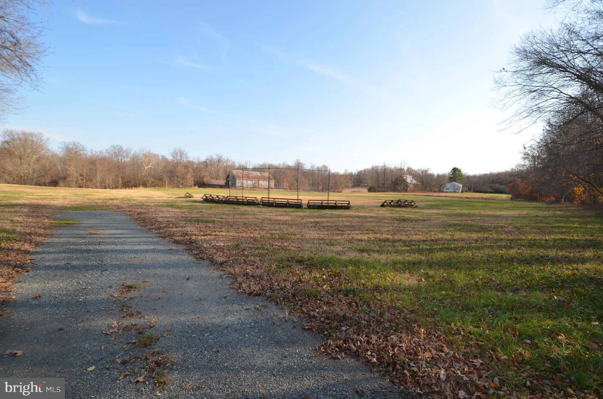 6095 Solomons Island Road Tracys Landing, MD 20779 - Photo 2 of 9 a view of an ocean and beach