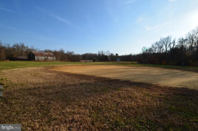 a view of an ocean beach and a yard