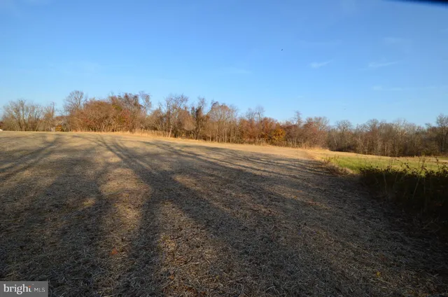 a view of an ocean and a mountain