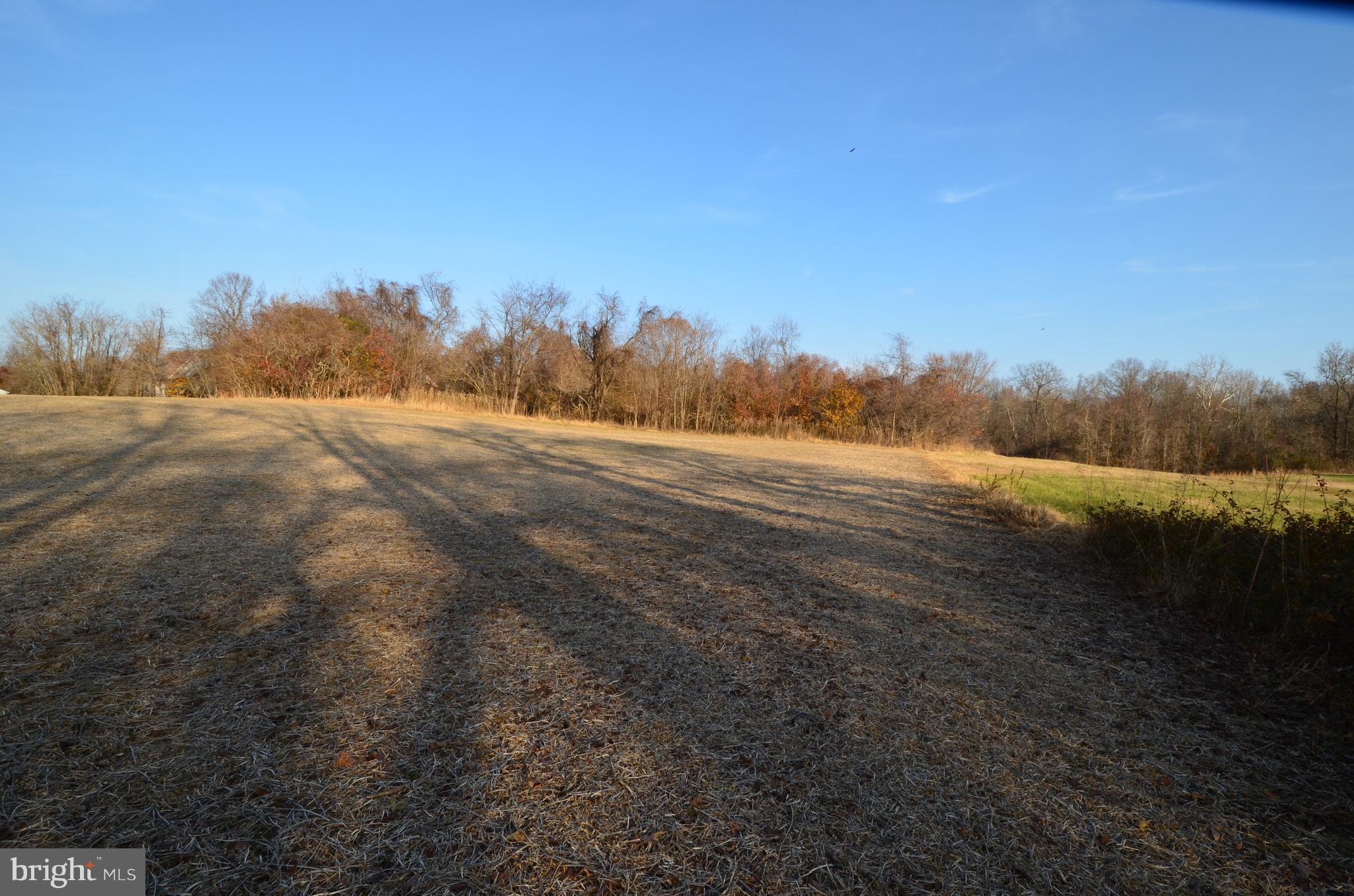 6095 Solomons Island Road Tracys Landing, MD 20779 - Photo 7 of 9 a view of an ocean and a mountain