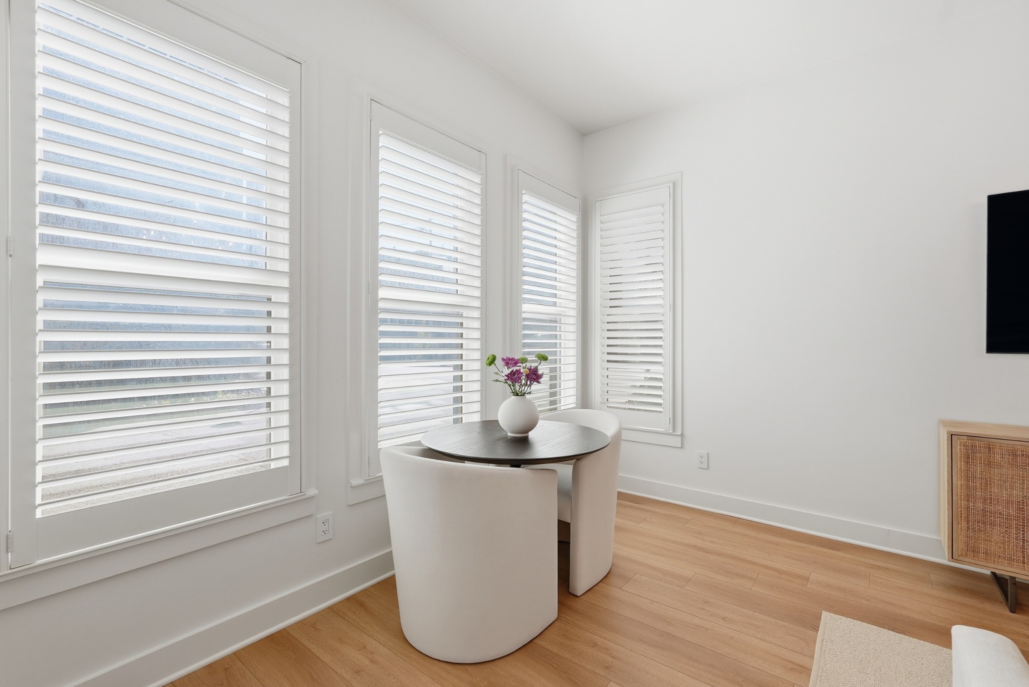 520 Madison Street Nashville, TN 37208 - Photo 7 of 16 a room with wooden floor and a window