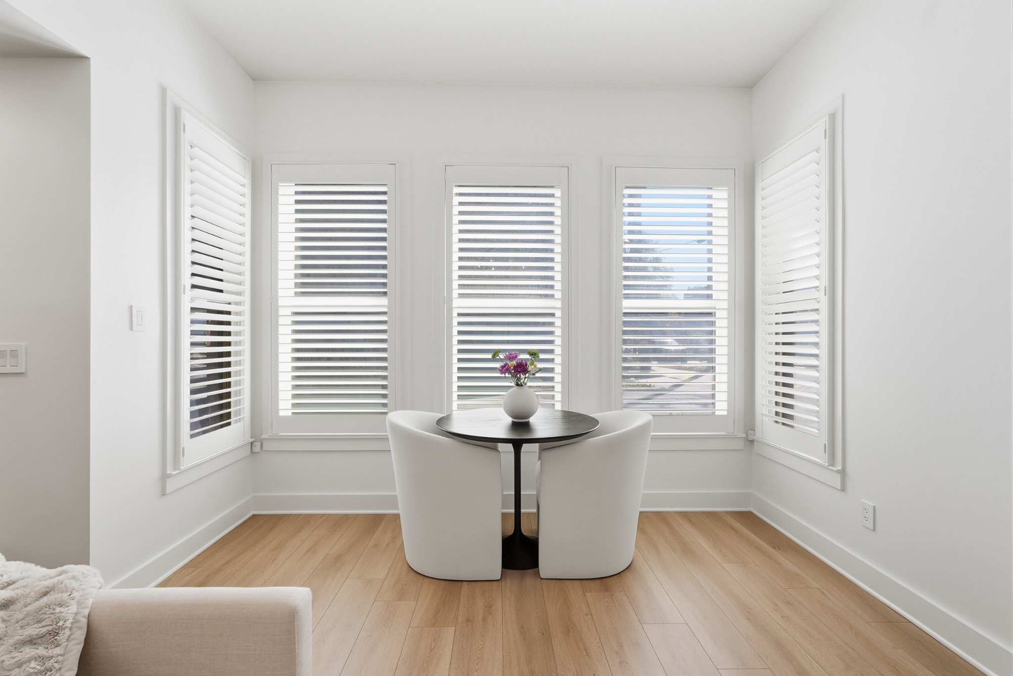 520 Madison Street Nashville, TN 37208 - Photo 8 of 16 a view of a room with wooden floor and a window