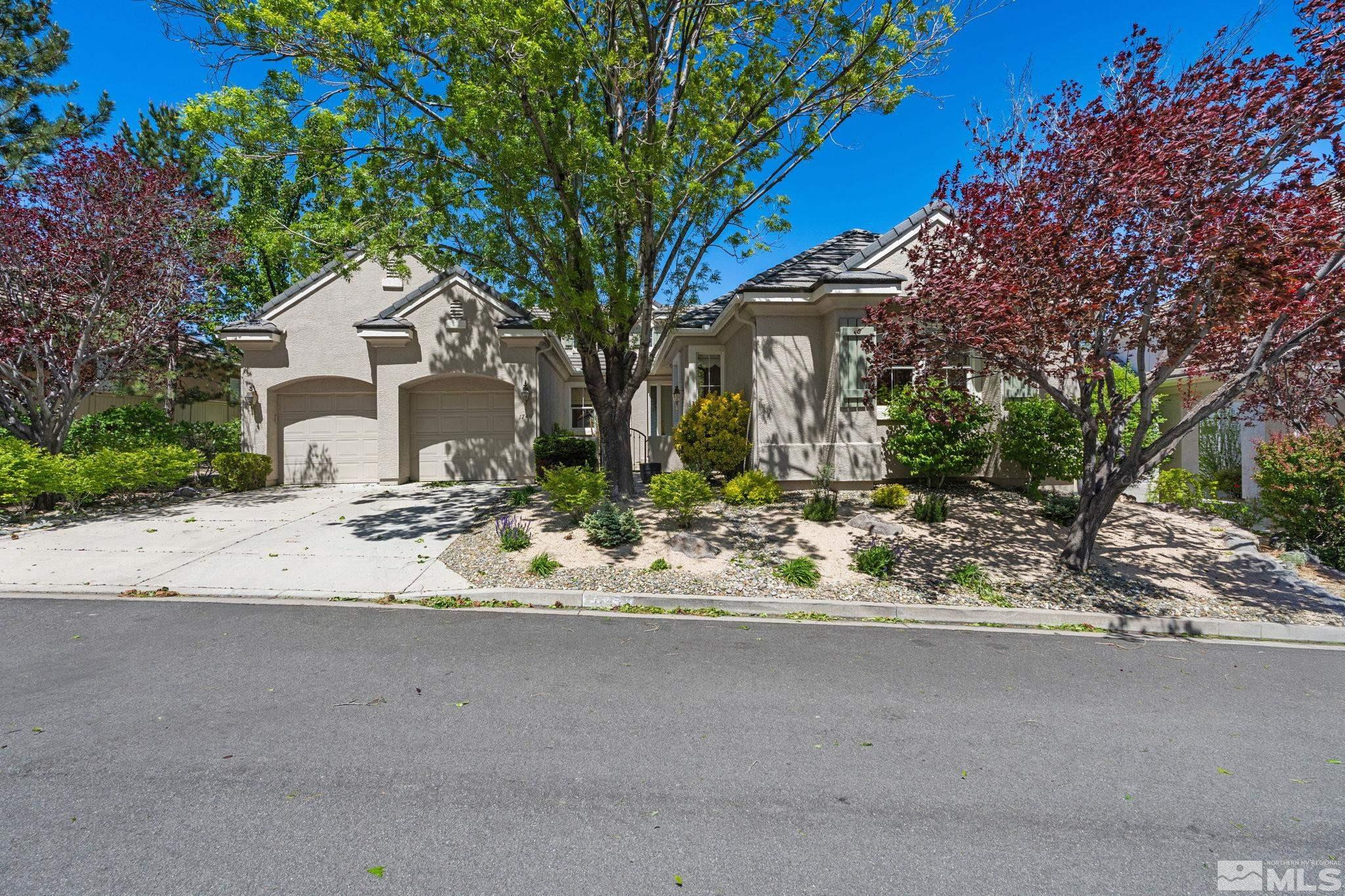 1745 Hunter Creek Road Reno, NV 89519 - Photo 1 of 40 a view of a house with a yard and large tree