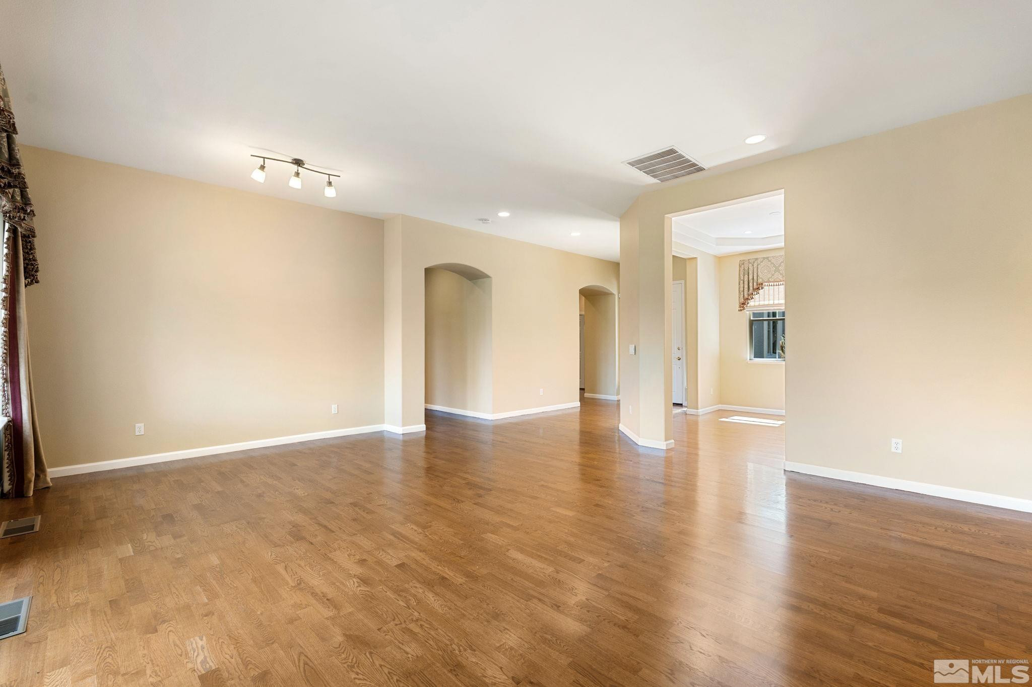 1745 Hunter Creek Road Reno, NV 89519 - Photo 12 of 40 a view of a livingroom with wooden floor