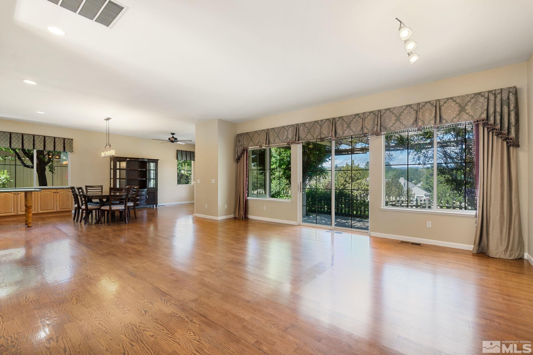 1745 Hunter Creek Road Reno, NV 89519 - Photo 17 of 40 a view of dining room with furniture and wooden floor