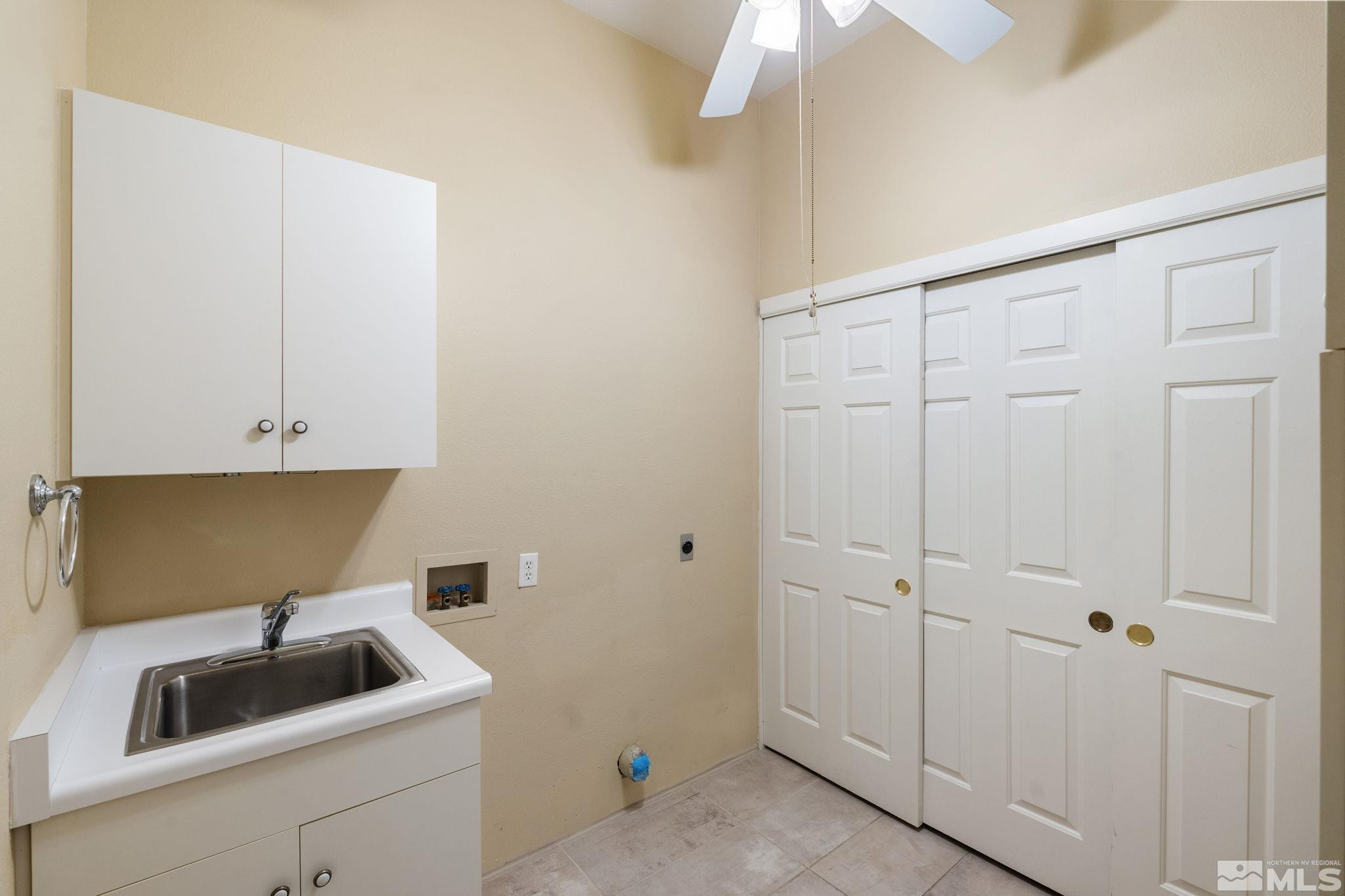 1745 Hunter Creek Road Reno, NV 89519 - Photo 37 of 40 a kitchen with a sink and cabinets