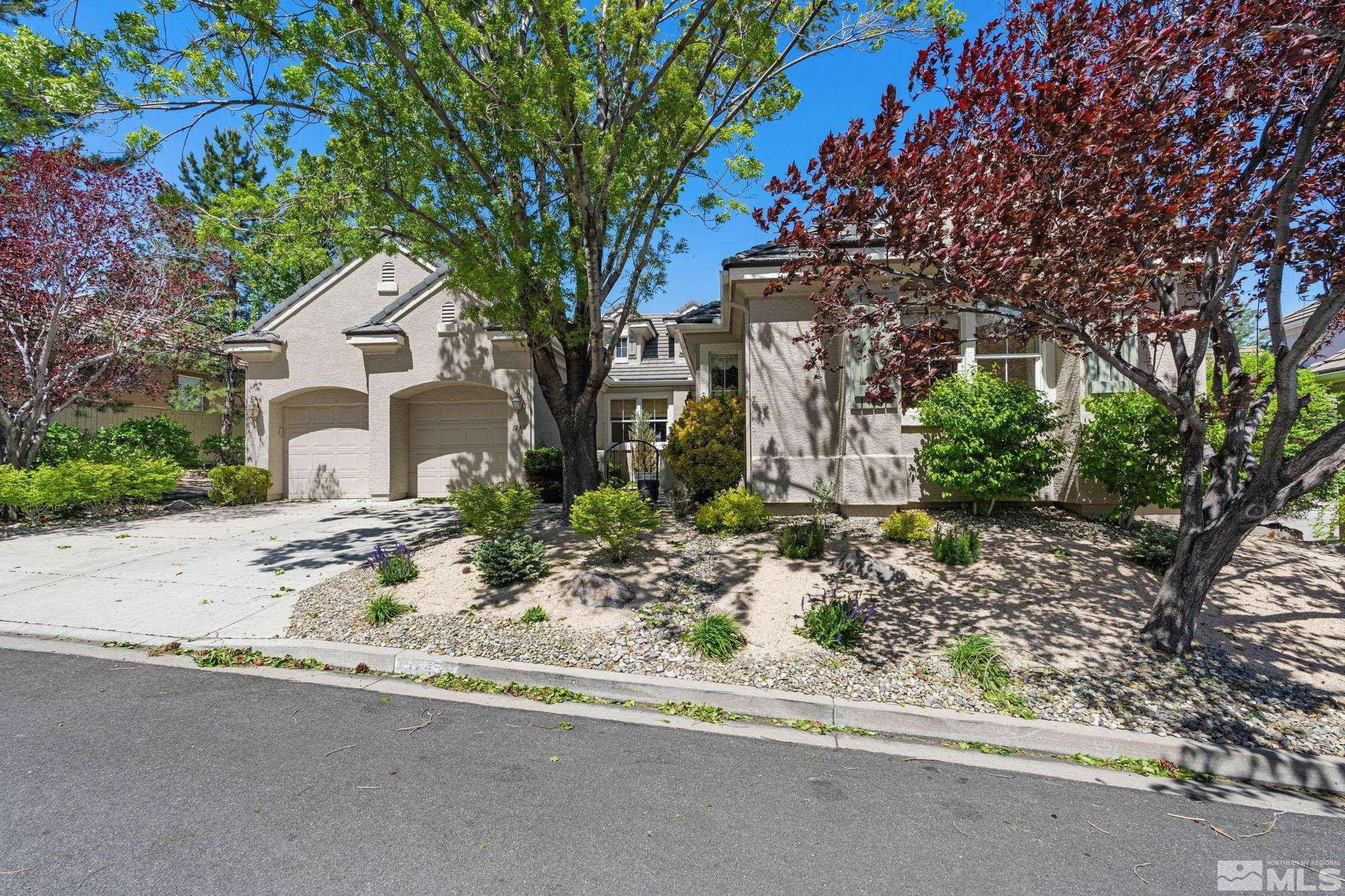 1745 Hunter Creek Road Reno, NV 89519 - Photo 6 of 40 front view of a house with a tree