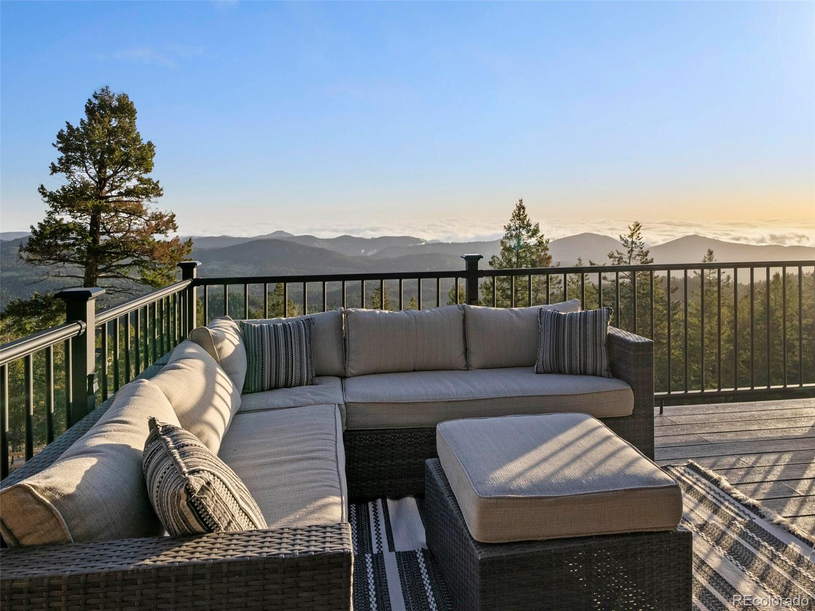 8335 Doubleheader Ranch Road Morrison, CO 80465 - Photo 24 of 40 a view of a balcony with furniture