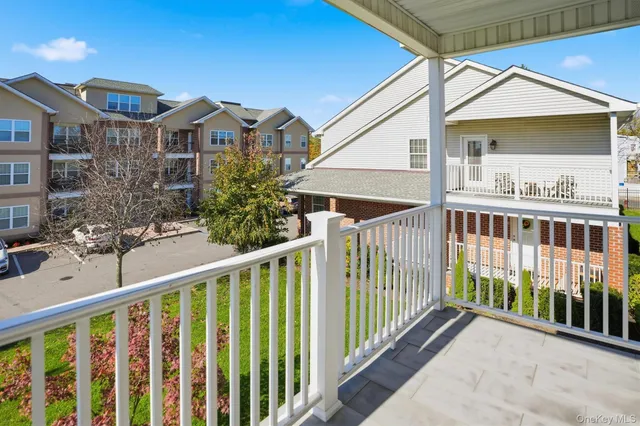 a view of a street from a balcony