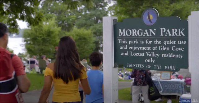 a view of path along with lots of trees