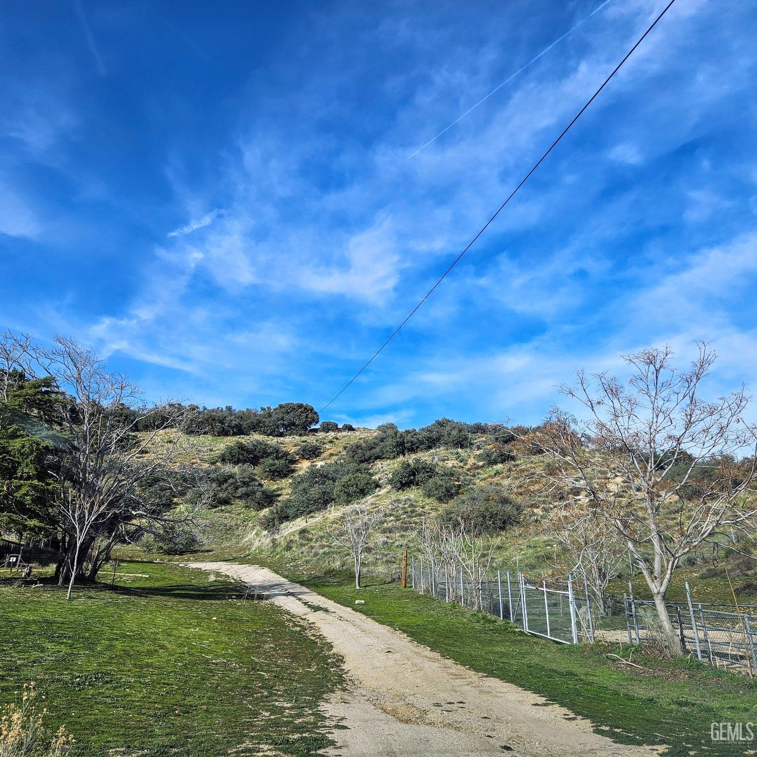 Undisclosed Address Lebec, CA 93243 - Photo 9 of 16 a view of a lake with a mountain in the background