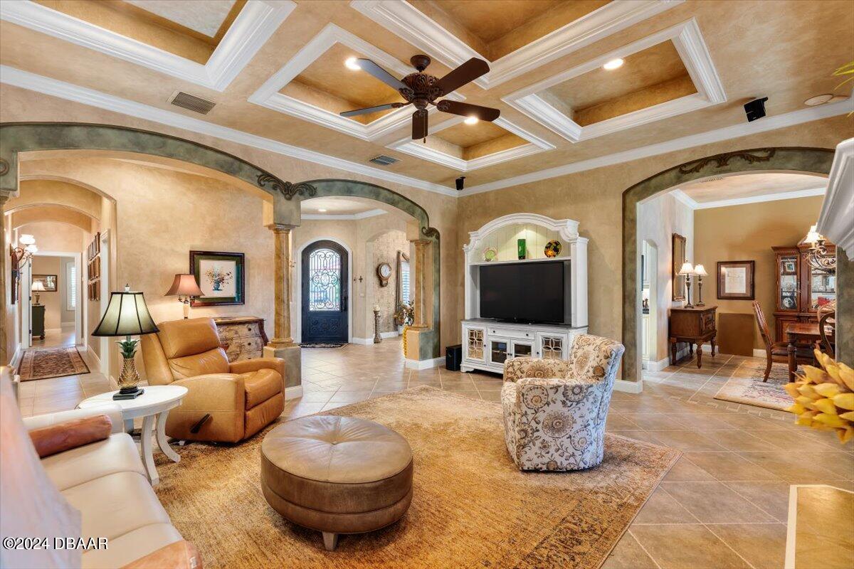 6 Old Canyon Lane Ormond Beach, FL 32174 - Photo 22 of 71 a living room with furniture and a flat screen tv