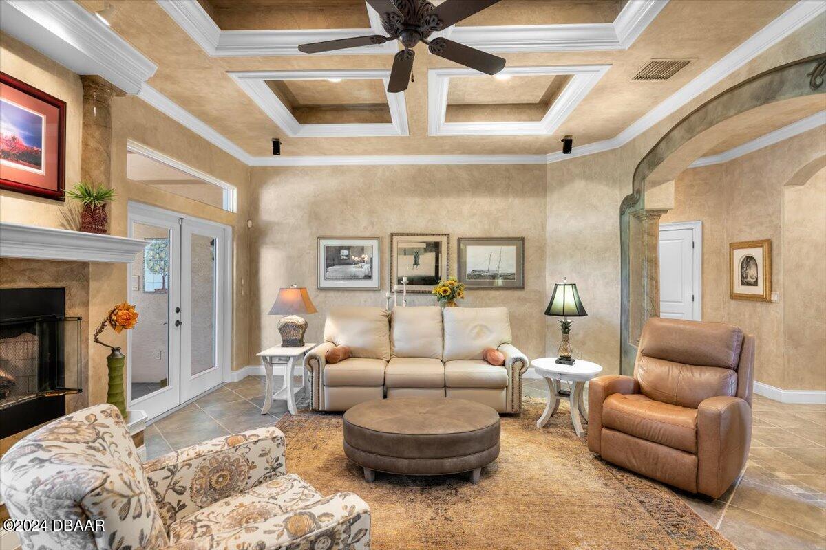 6 Old Canyon Lane Ormond Beach, FL 32174 - Photo 25 of 71 a living room with furniture and a fireplace