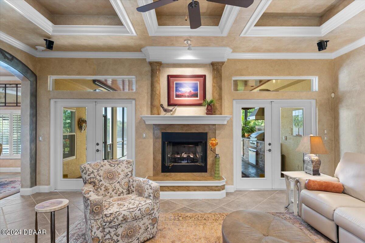 6 Old Canyon Lane Ormond Beach, FL 32174 - Photo 26 of 71 a living room with furniture and a fireplace