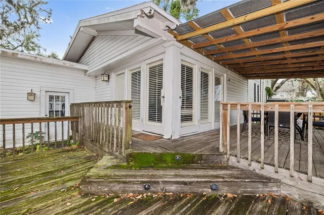 an aerial view of residential houses with city view
