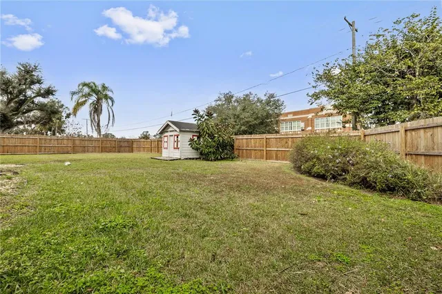 a view of street with parked cars