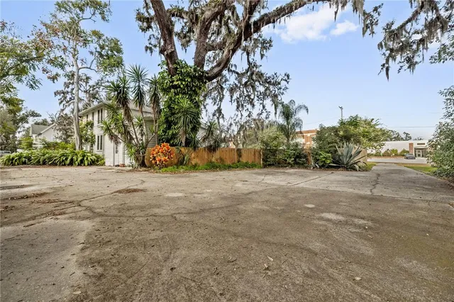 a front view of a building with sitting area