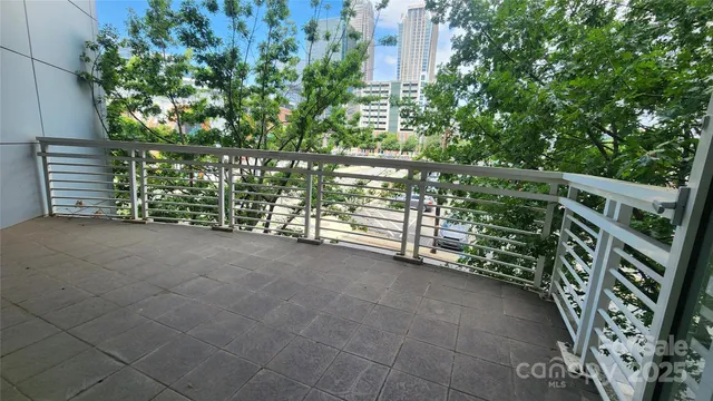 a view of a house with a tree