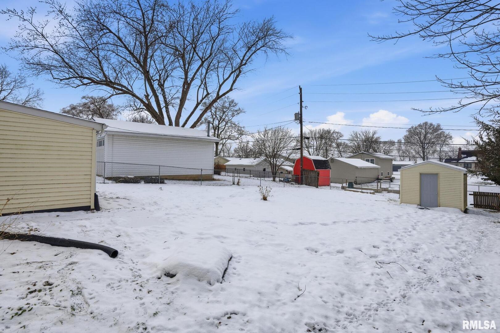 1015 7th Street Colona, IL 61241 - Photo 17 of 19 a view of the backyard of the house