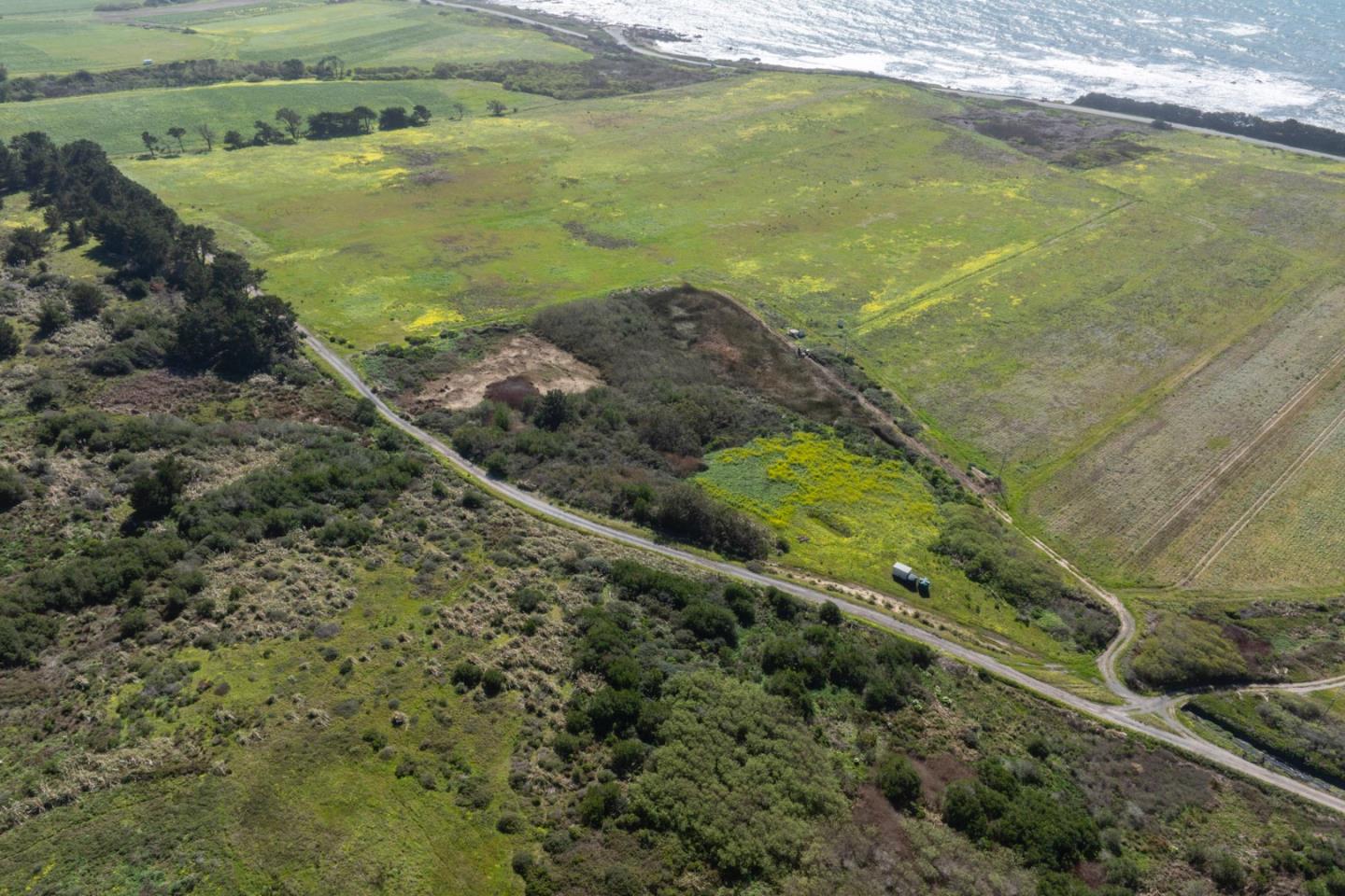 1275 Reservoir Road Pescadero, CA 94060 - Photo 6 of 9 a view of an ocean from a yard