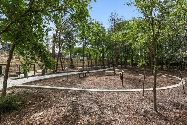 a view of a patio with chairs and a table