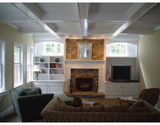 71 Stone School Road Sutton, MA 01590 - Photo 13 of 30 a living room with furniture a flat screen tv and a fireplace