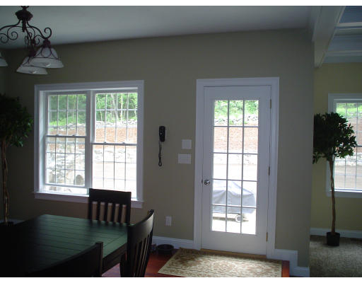 71 Stone School Road Sutton, MA 01590 - Photo 17 of 30 a living room with furniture and a window