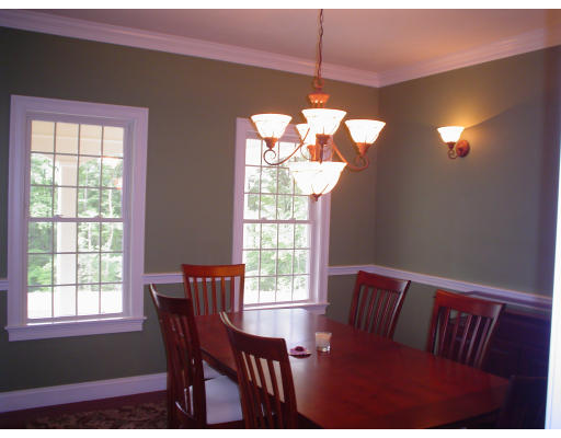 71 Stone School Road Sutton, MA 01590 - Photo 18 of 30 a view of a dining room with furniture window and outside view