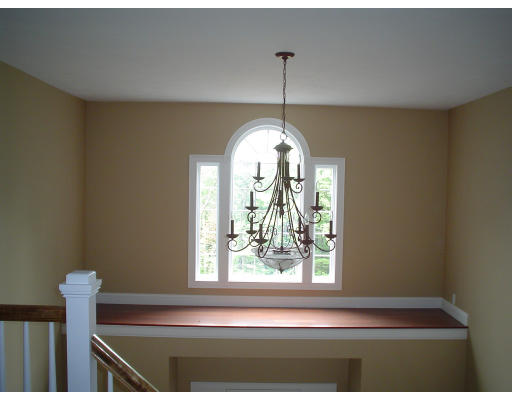71 Stone School Road Sutton, MA 01590 - Photo 7 of 30 a front door view with a chandelier