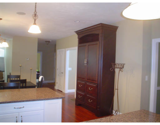 71 Stone School Road Sutton, MA 01590 - Photo 10 of 30 a bedroom with a bed and a dresser