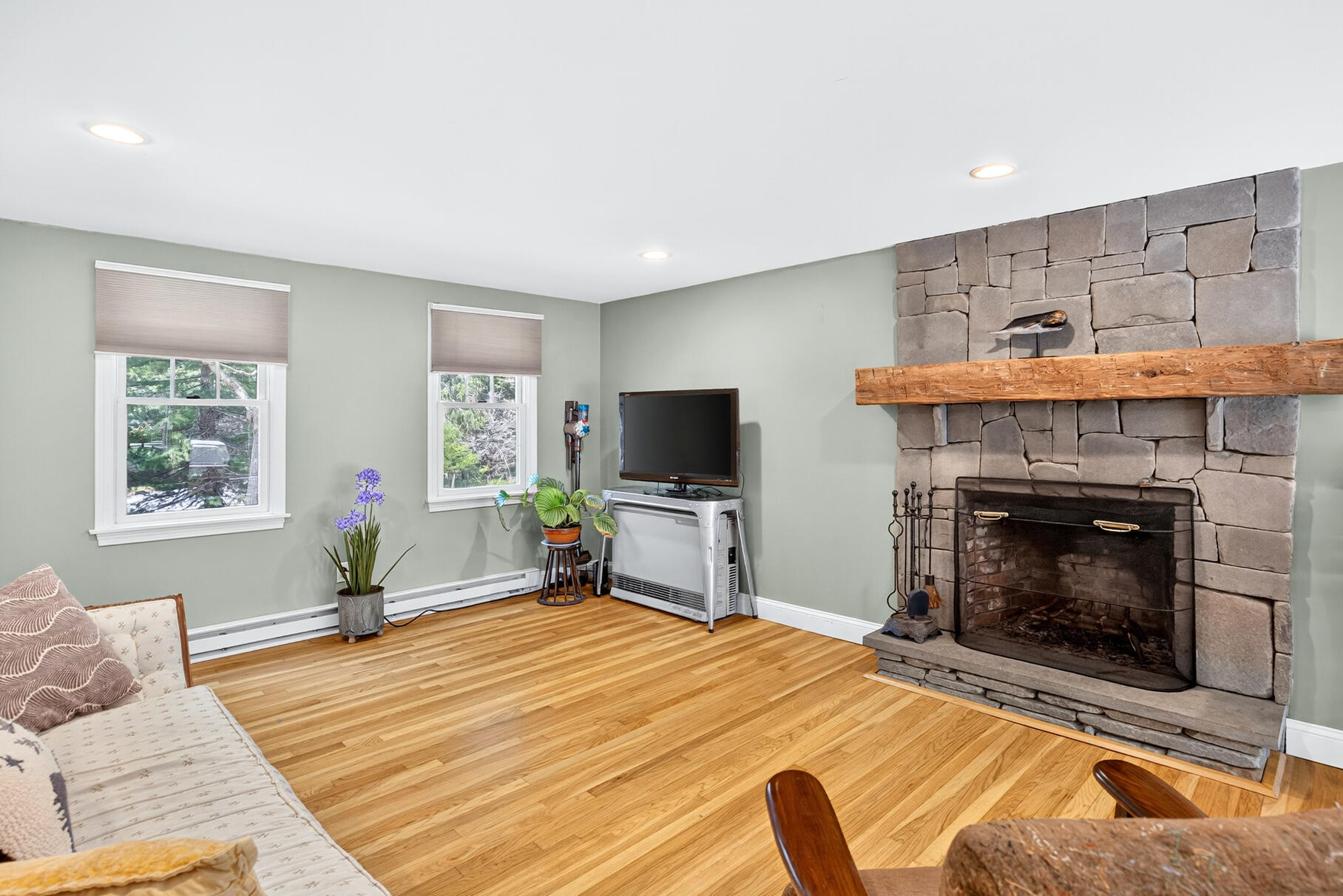 33 Captain William Arthur Road Brewster, MA 02631 - Photo 13 of 40 a bedroom with a bed and a flat screen tv