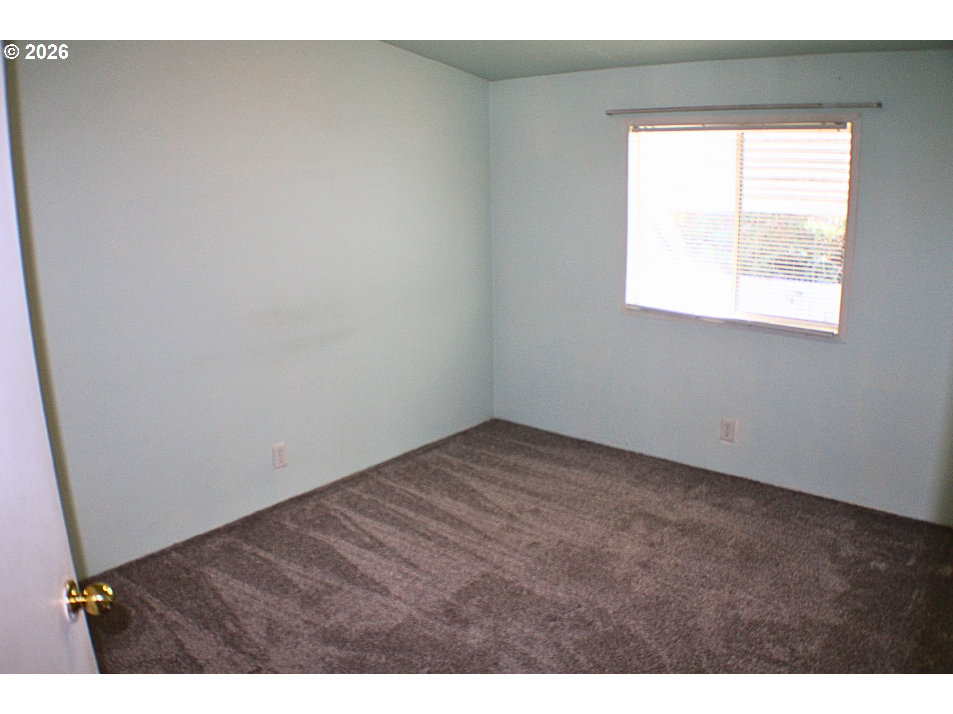130 Stephanie Court Winston, OR 97496 - Photo 17 of 22 a view of an empty room and window