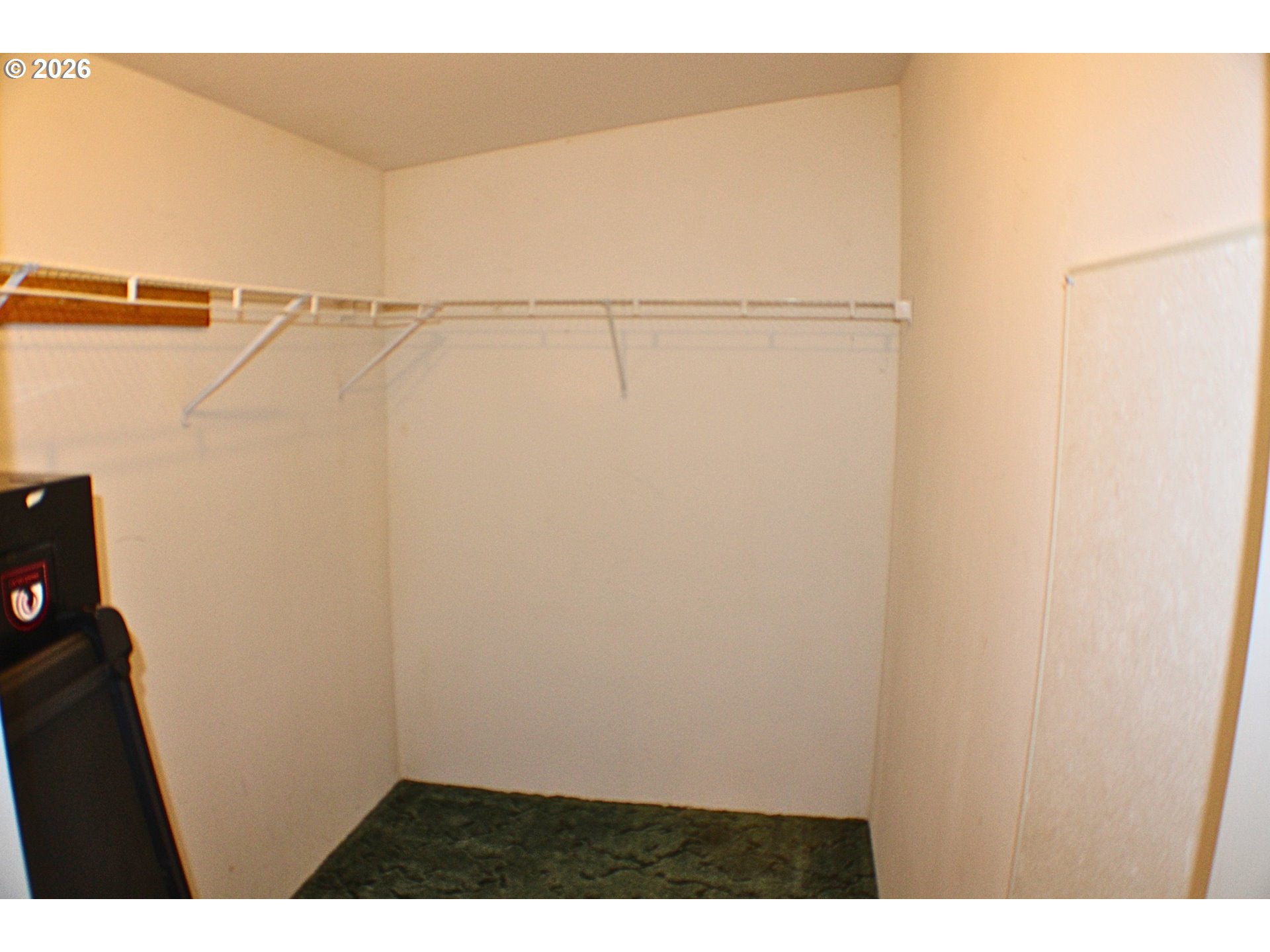 130 Stephanie Court Winston, OR 97496 - Photo 18 of 22 a view of a room with racks on the wall
