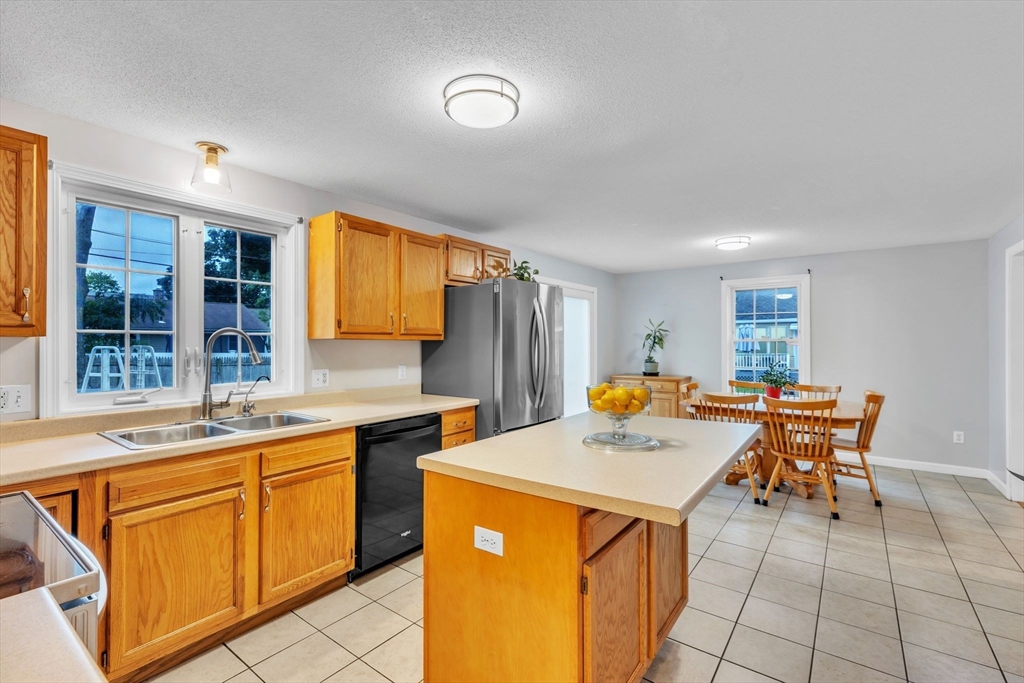 44 Border Street Springfield, MA 01104 - Photo 13 of 37 a view of a kitchen counter space and a window