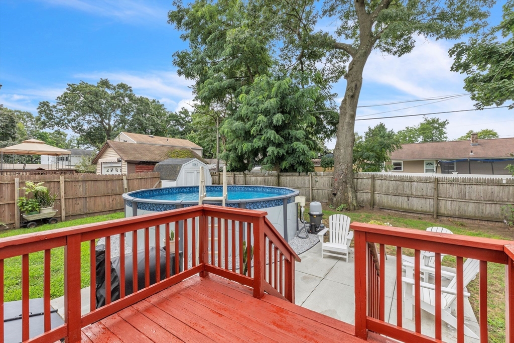 44 Border Street Springfield, MA 01104 - Photo 31 of 37 a balcony with wooden floor and outdoor space