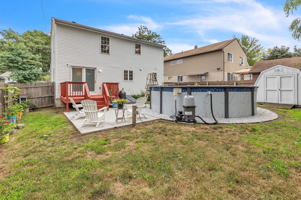 44 Border Street Springfield, MA 01104 - Photo 32 of 37 a view of a house with backyard and sitting area