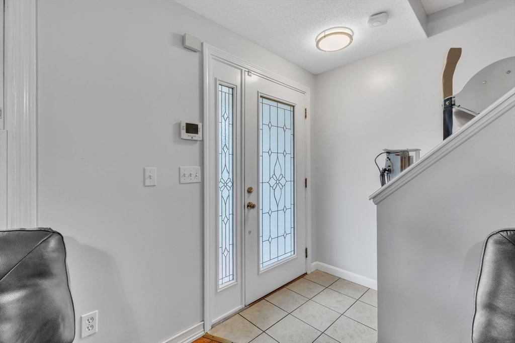 44 Border Street Springfield, MA 01104 - Photo 4 of 37 a view of a hallway with closet area