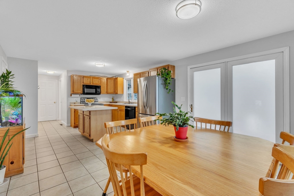 44 Border Street Springfield, MA 01104 - Photo 8 of 37 a kitchen with a sink appliances and cabinets