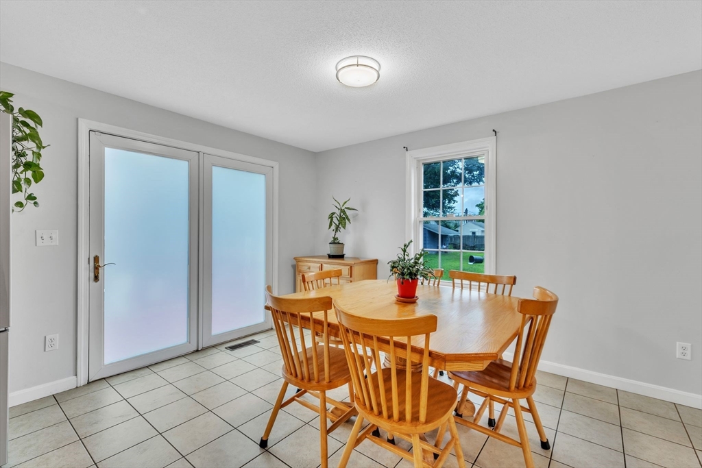 44 Border Street Springfield, MA 01104 - Photo 9 of 37 a view of a dining room with furniture
