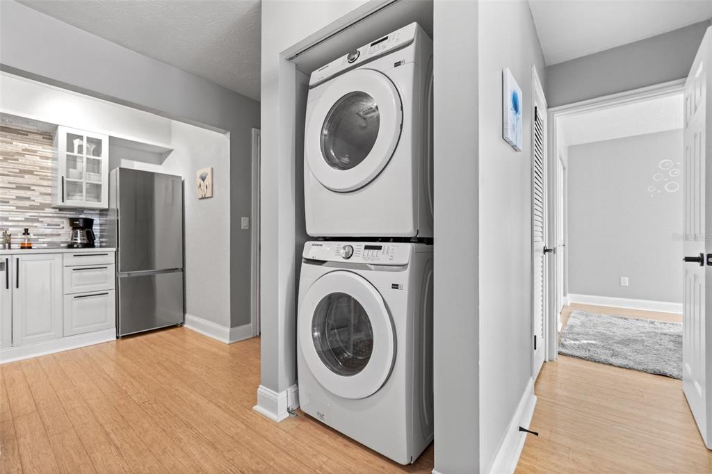 3443 Clark Road, Unit 242 Sarasota, FL 34231 - Photo 11 of 21 a view of a kitchen with washer and dryer
