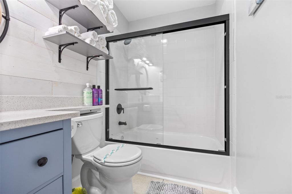 3443 Clark Road, Unit 242 Sarasota, FL 34231 - Photo 16 of 21 a bathroom with a sink toilet and shower