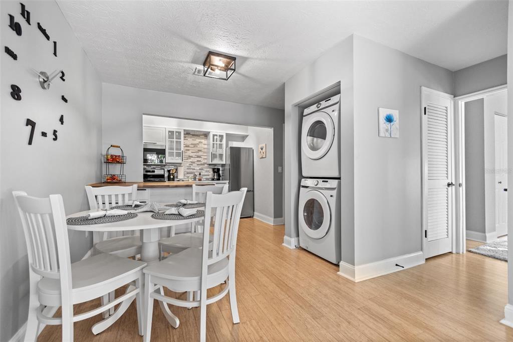 3443 Clark Road, Unit 242 Sarasota, FL 34231 - Photo 10 of 21 a view of a dining table and chairs in a room