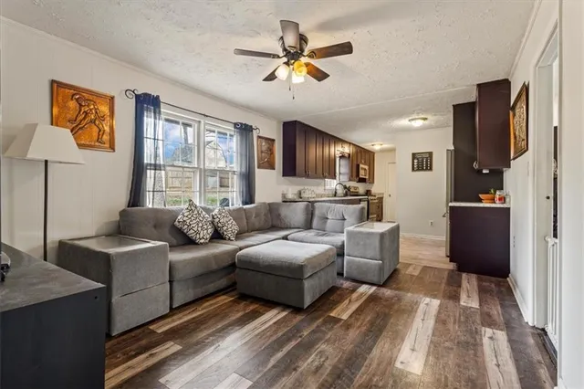 a kitchen with a sink and wooden cabinets